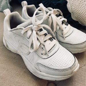 Skechers little girl white sneakers.